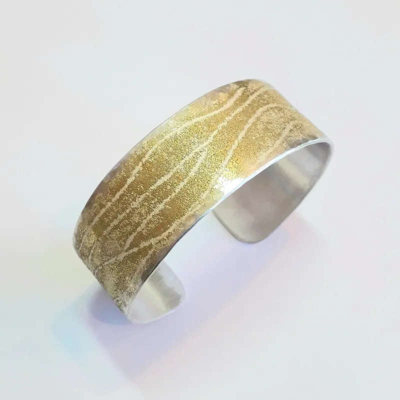 Armreif in Silber und 750-Gelbgold